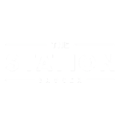 the station grocer logo white